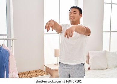 Young Chinese Man Somnambulist Sleepwalking At Bedroom