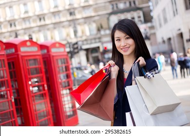 Young Chinese Tourist Shopping In London