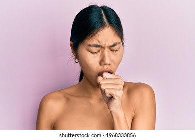 Young Chinese Woman Standing Topless Showing Skin Feeling Unwell And Coughing As Symptom For Cold Or Bronchitis. Health Care Concept. 