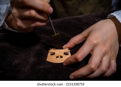 Young Chinese Woman Violin Maker Signs The Jumper Of Her Violin With Fire With Her Name In The Workshop