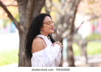 Young Christian Girl Praying Outside, Hopeness, Believer, Religion Curly Christian Female