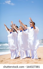 young church choir worshiping on the beach