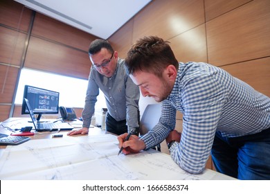 Young Civil Engineers Review Drawing Of Project For Construction At The Office. It Is Traditionally Broken Into A Number Of Sub-disciplines. It Is Considered The Second-oldest Engineering.