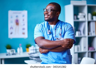 Young Clinician In Uniform Looking Sideways