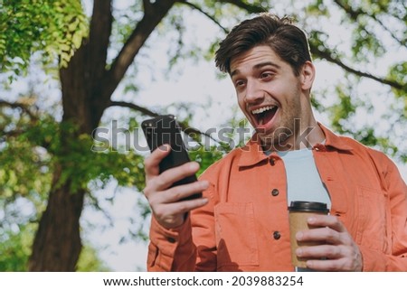 Similar – Image, Stock Photo Man in Orange Jacket Enjoying Misty Iceland Landscape