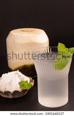Young Coconut With Slice of Young Coconut Meat and Coconut Water.