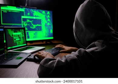 the young coder working on the computer.cyber security.software devolopment.