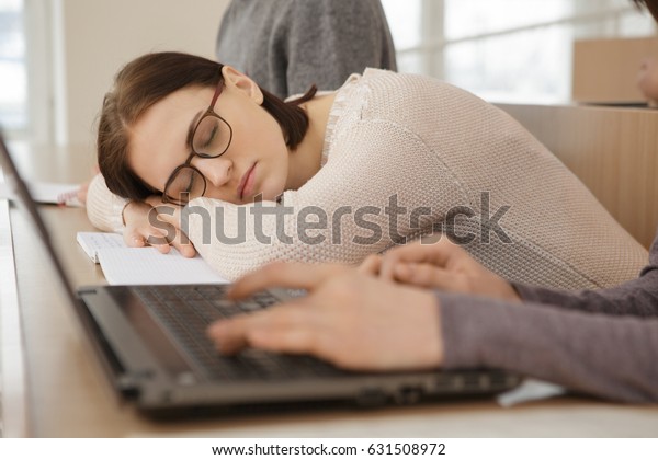 young-college-girl-sleeping-on-600w-631508972.jpg