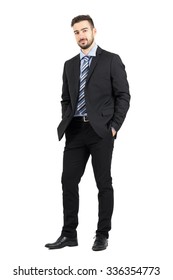 Young Confident Bearded Business Man In Suit Looking At Camera.  Full Body Length Portrait Isolated Over White Studio Background. 