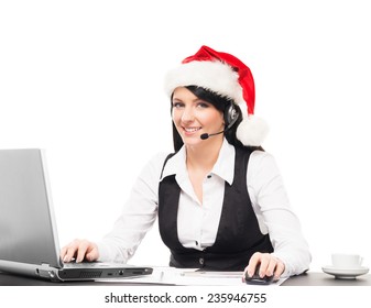 Young, Confident And Beautiful Support Operator In Christmas Hat Working In A Call Center 