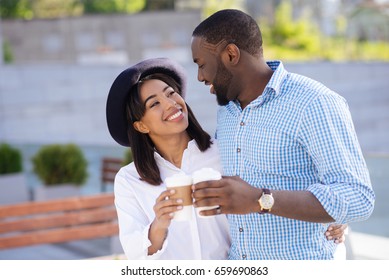 Young confident couple feeling happy and relaxed together