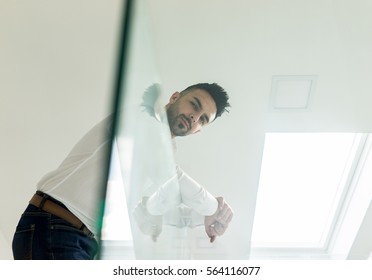 Young confident man posing