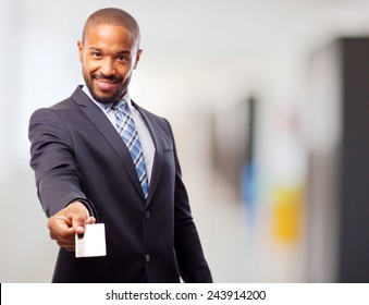 Young Cool Black Man Offering A Credit Card