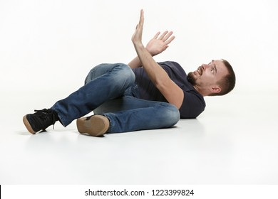 The Young Cool Man Full Body Scared Pose At White Studio