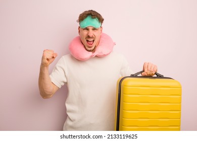 Young Cool Man Shouting Aggressively With An Angry Expression. Flight Passenger Concept