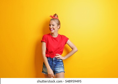 Young Cool Woman On Yellow Background