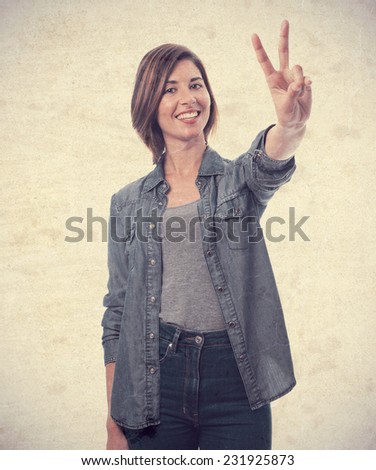 young cool woman victory sign