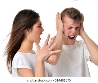 Young couple arguing with each other woman shouting yelling at her boyfriend isolated on a white background