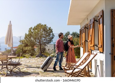 Young couple arriving to at holiday home 
 - Shutterstock ID 1663446190