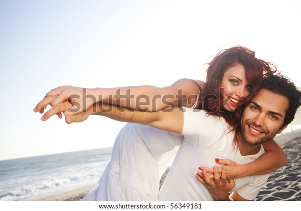 Young Couple Beach Posing Stock Photo (Edit Now) 56349181