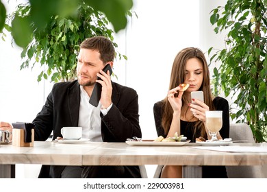 Young Couple Being Busy Using Their Stock Photo 229003981 | Shutterstock