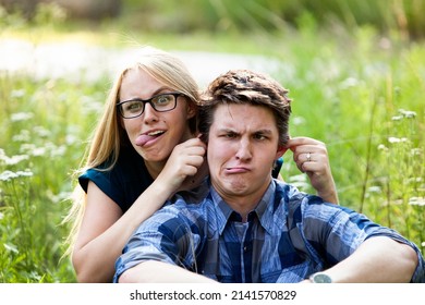 A Young Couple Being Silly