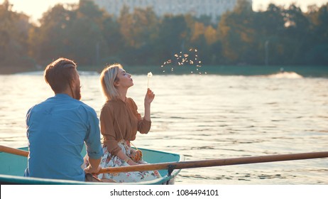 Young Couple In A Boat On A Date