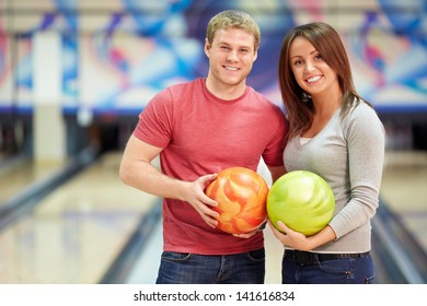 Young Couple In Bowling