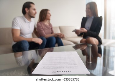 Young couple and businesswoman discussing prenuptial agreement, meeting with financial adviser or agent for investment, event wedding planner, health life insurance, focus on contract
