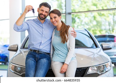 Young couple buying a car
