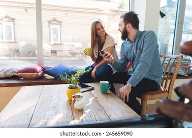 Young Couple In A Cafe