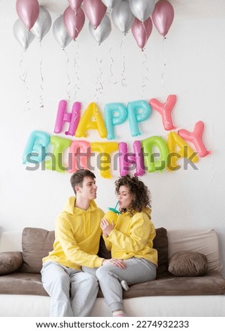 Similar – Young couple celebrating a birthday