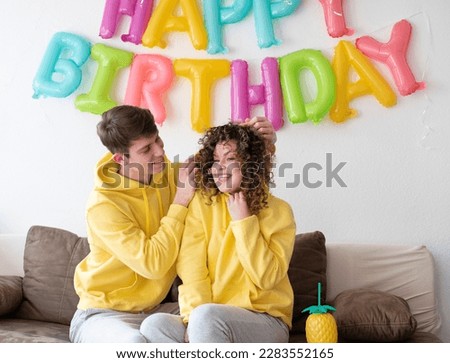 Similar – Young couple celebrating a birthday