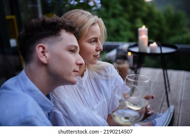 Young Couple Clinking With Wine Outdoors, Weekend Away In Tiny House In Countryside, Sustainable Living.