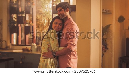 Young Couple Dancing in the Kitchen with Calm Passion. Moment of Love and Intimacy, Girfriend Tenderly Puts Her Head on Mans Chest where his loving heart beats. Happiest people in the world