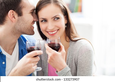 Young Couple Drinking Wine