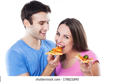 Young Couple Eating Pizza 