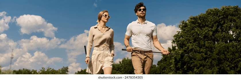 A young couple in elegant clothing walks across a luxurious golf course, enjoying the refined atmosphere. - Powered by Shutterstock