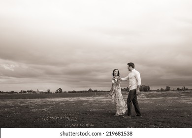 Young Couple Engagement Photos Outdoors