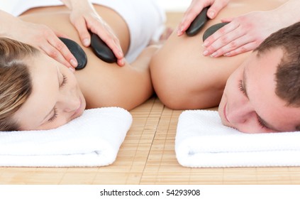 Young Couple Enjoying A Spa Treatment In A Spa Center