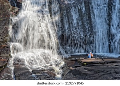 Young Couple Enjoying The View At High Falls In The DuPont State Forest In North Carolina