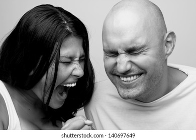 Young Couple Fighting.Studio Shot