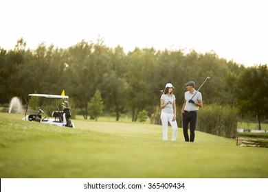 Young Couple At Golf Court