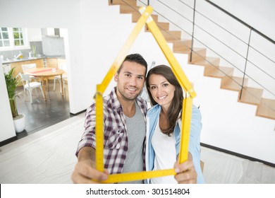 Young Couple Happy In A New House