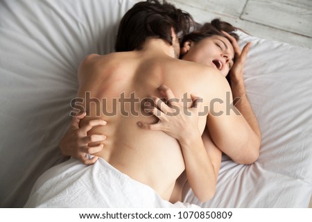 Young Couple Having Passionate Intense Sex Hot Woman Moaning In Ecstasy Embracing Man Scratching His Young Couple Having Passionate Intense Sex Hot Woman Moaning In Ecstasy Embracing Man Scratching His
