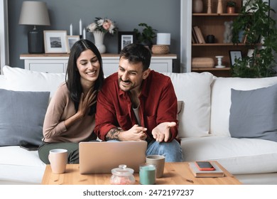 Young couple having video call from home with their psychotherapist, after online therapy for communication problems, relationship difficulties and marriage counseling to say thank you to her for help - Powered by Shutterstock