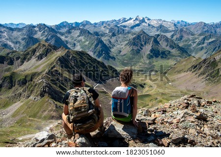 young couple of hiker in the french Pyrenees mountains