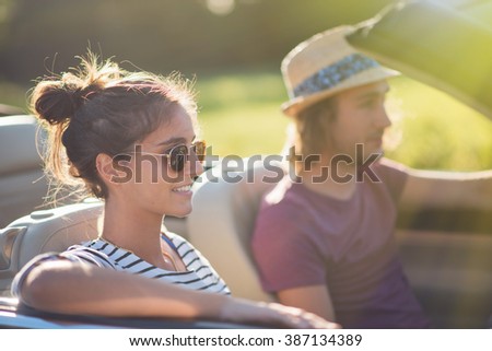 Similar – Two young women resting sitting inside of car