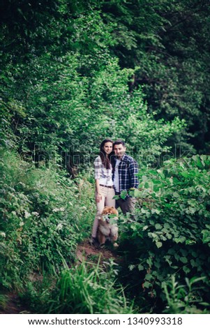 Similar – Women friends laughing while walking in forest