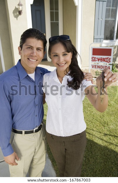 Young Couple Holding Keys Outside New Stock Photo (Edit Now) 167867003